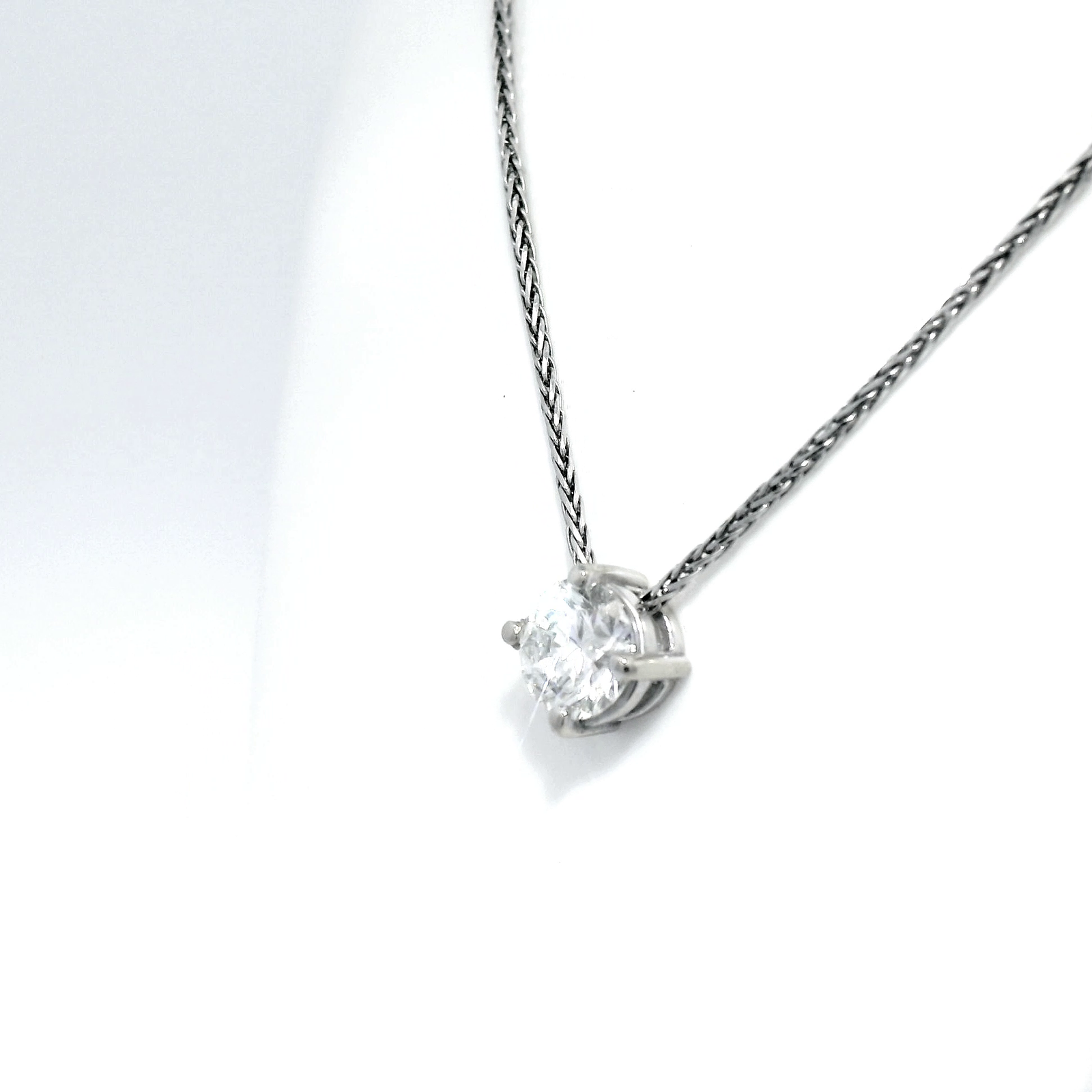 Diamond Slider Pendant on White Gold Wheat Chain.