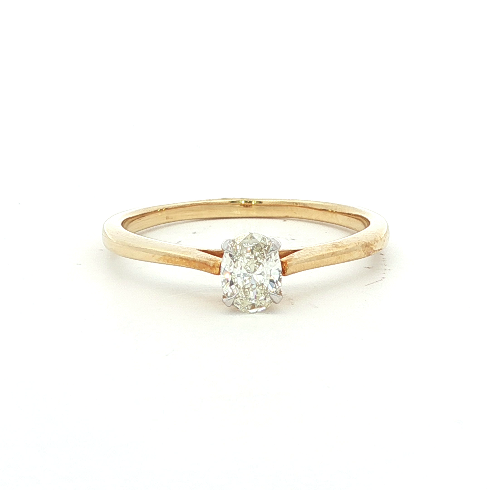Oval Cut Diamond Solitaire Ring in Yellow Gold
