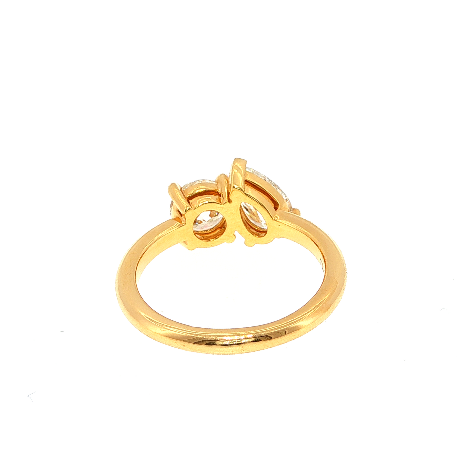 Round and Pear Shaped Diamonds Set in Yellow Gold