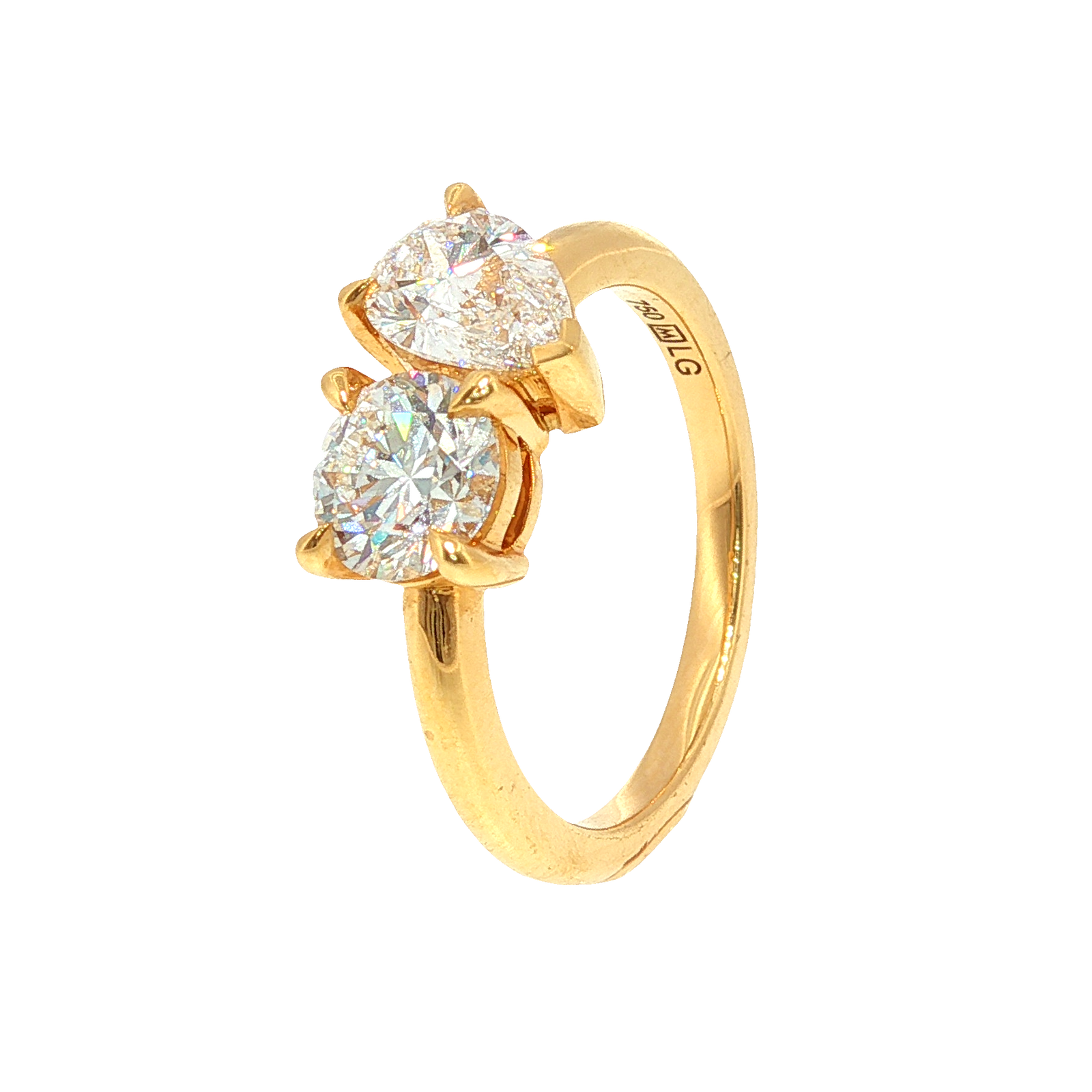 Round and Pear Shaped Diamonds Set in Yellow Gold