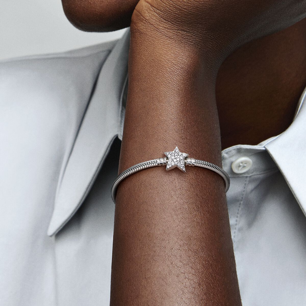 Snake chain sterling silver bracelet with star clasp and clear cubic zirconia