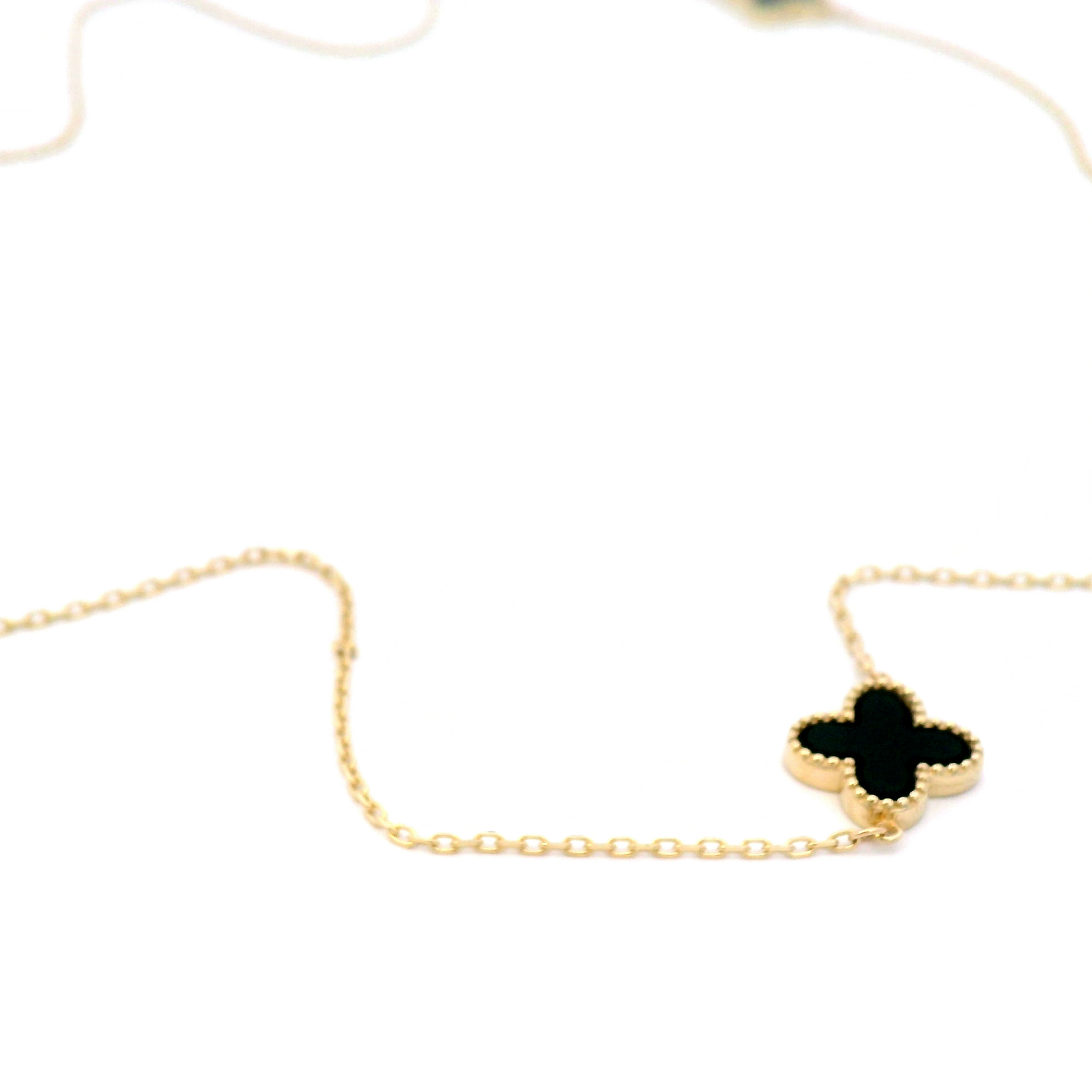 Black Onyx Clover Necklace in Yellow Gold