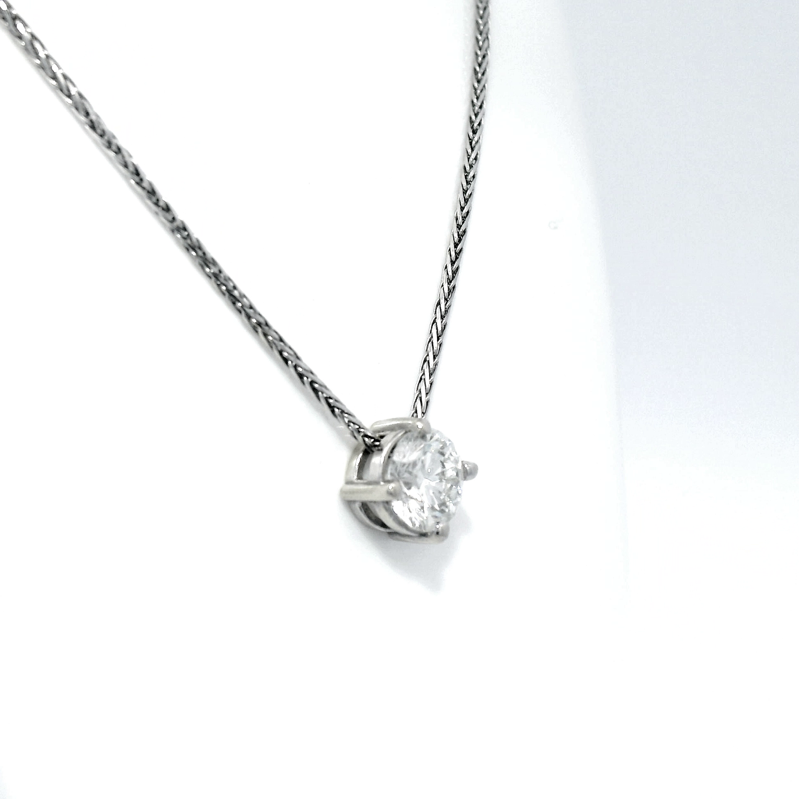 Diamond Slider Pendant on White Gold Wheat Chain.