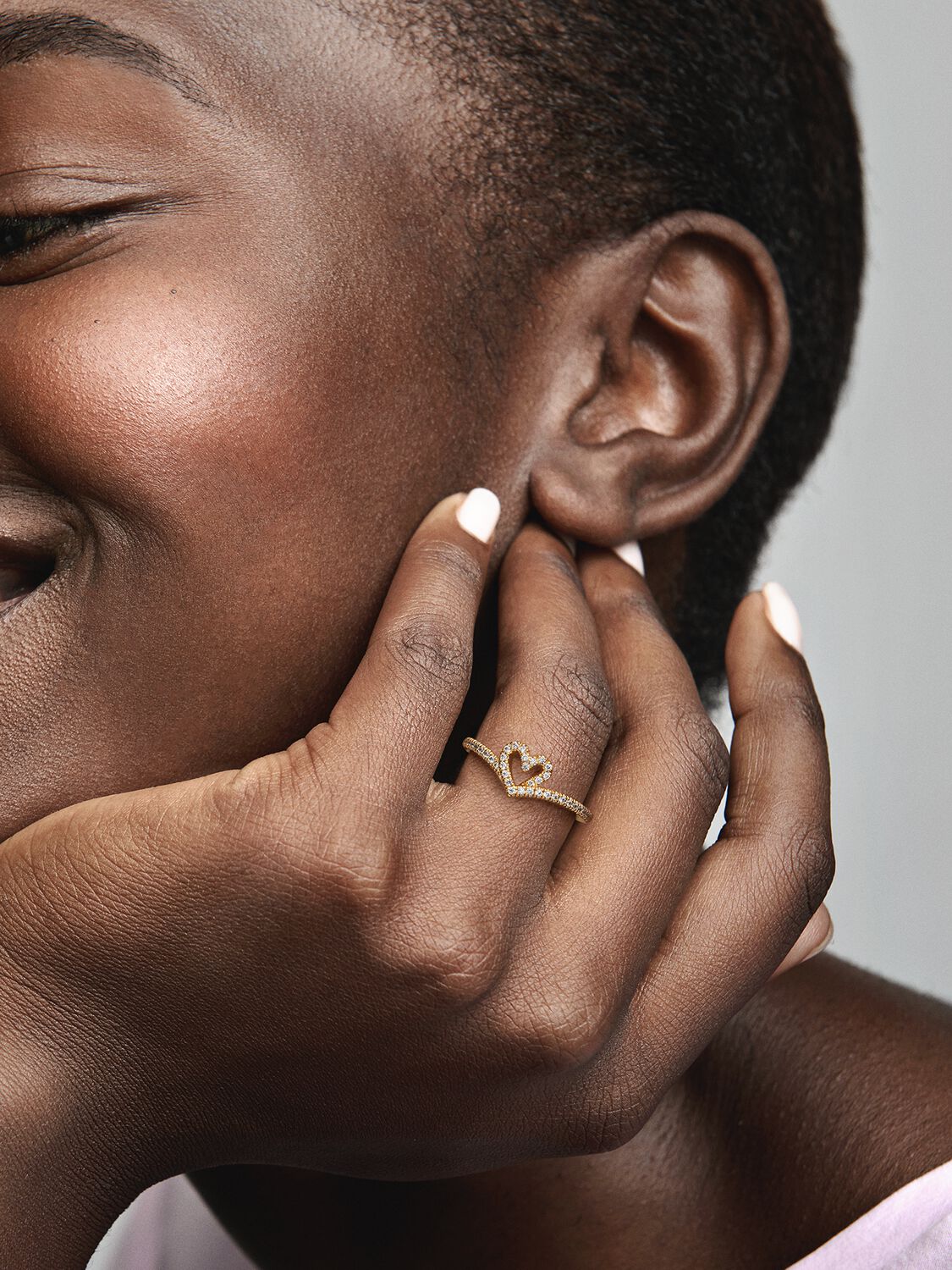 Heart and wishbone 14k gold-plated ring with clear cubic zirconia