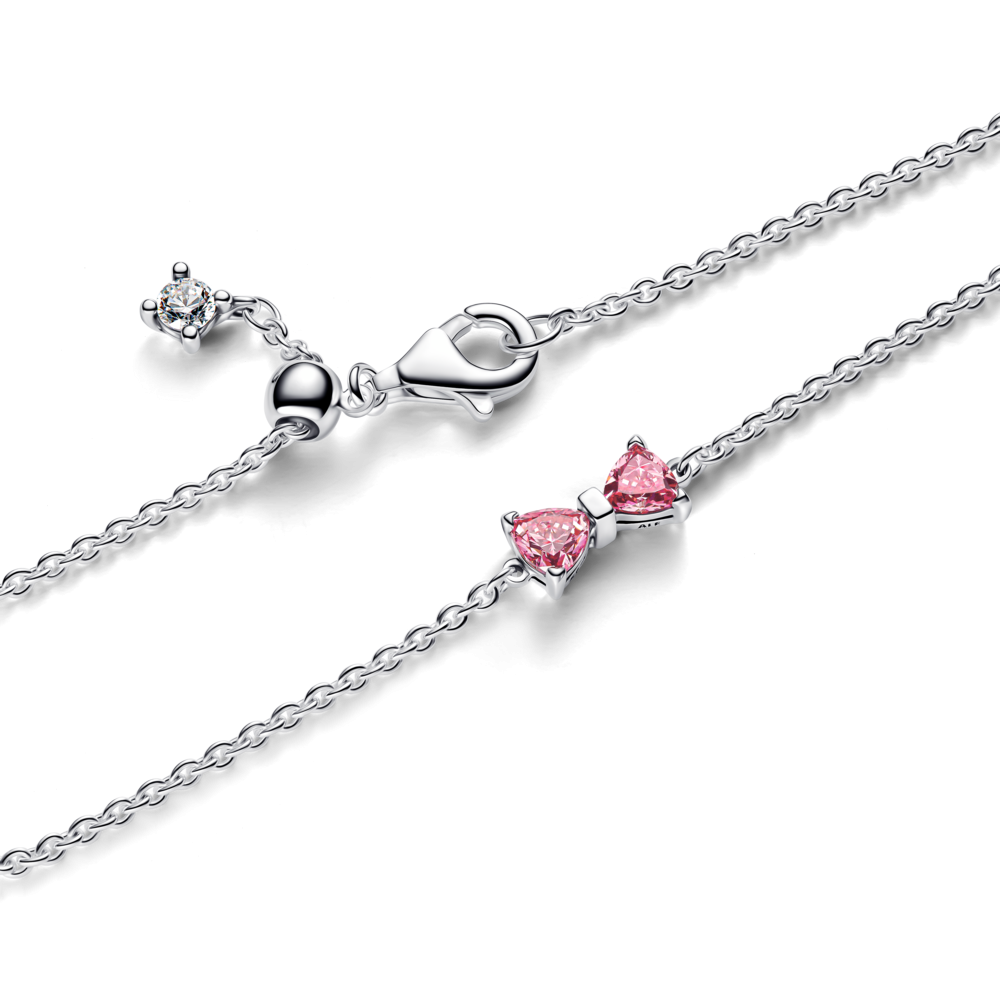 Bow sterling silver bracelet with fancy pink and clear cubic zirconia