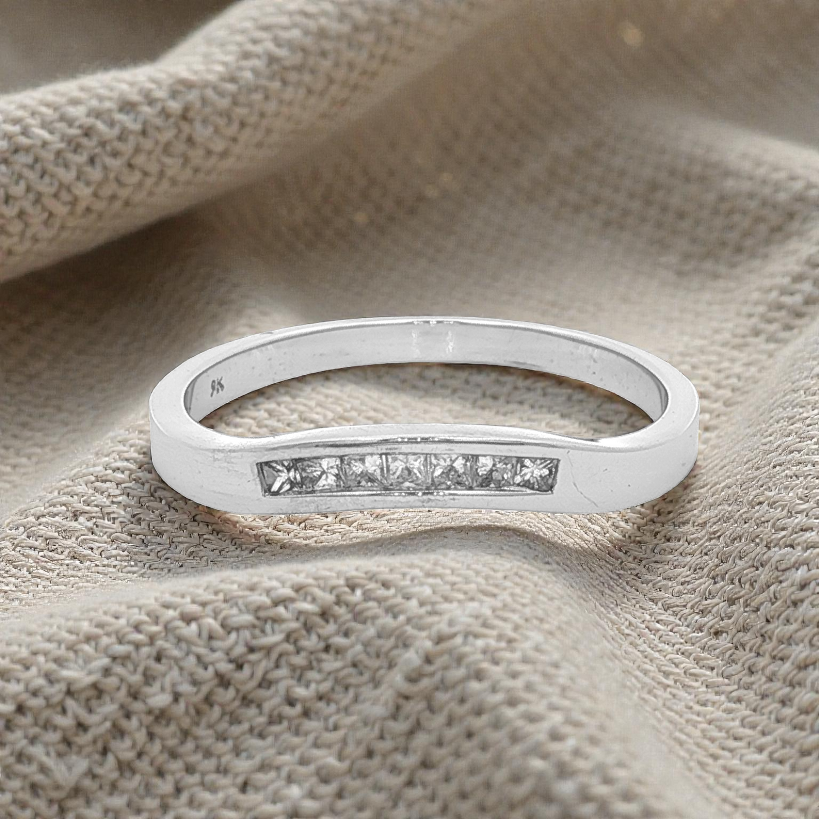 Curved White Gold Princess Cut Diamond Ring