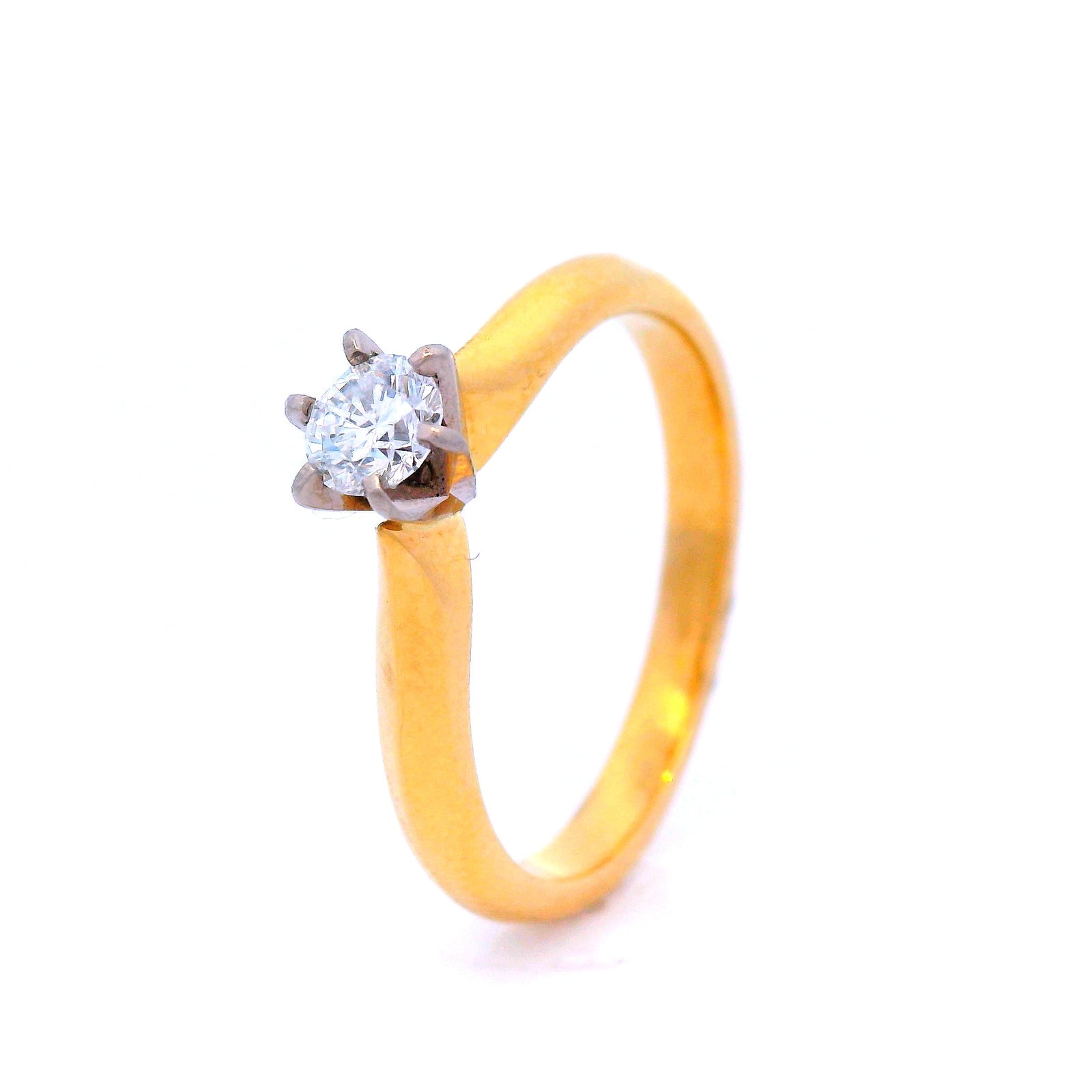 Diamond in a 6 Claw Yellow Gold Setting