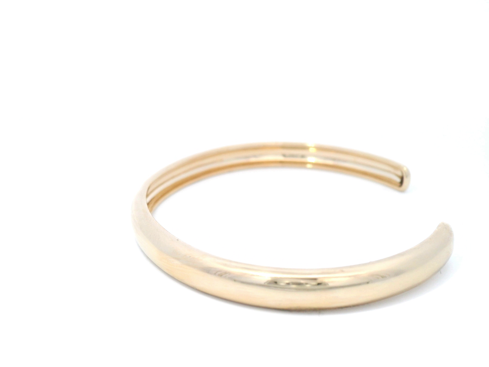 Hollow Bangle In Yellow Gold