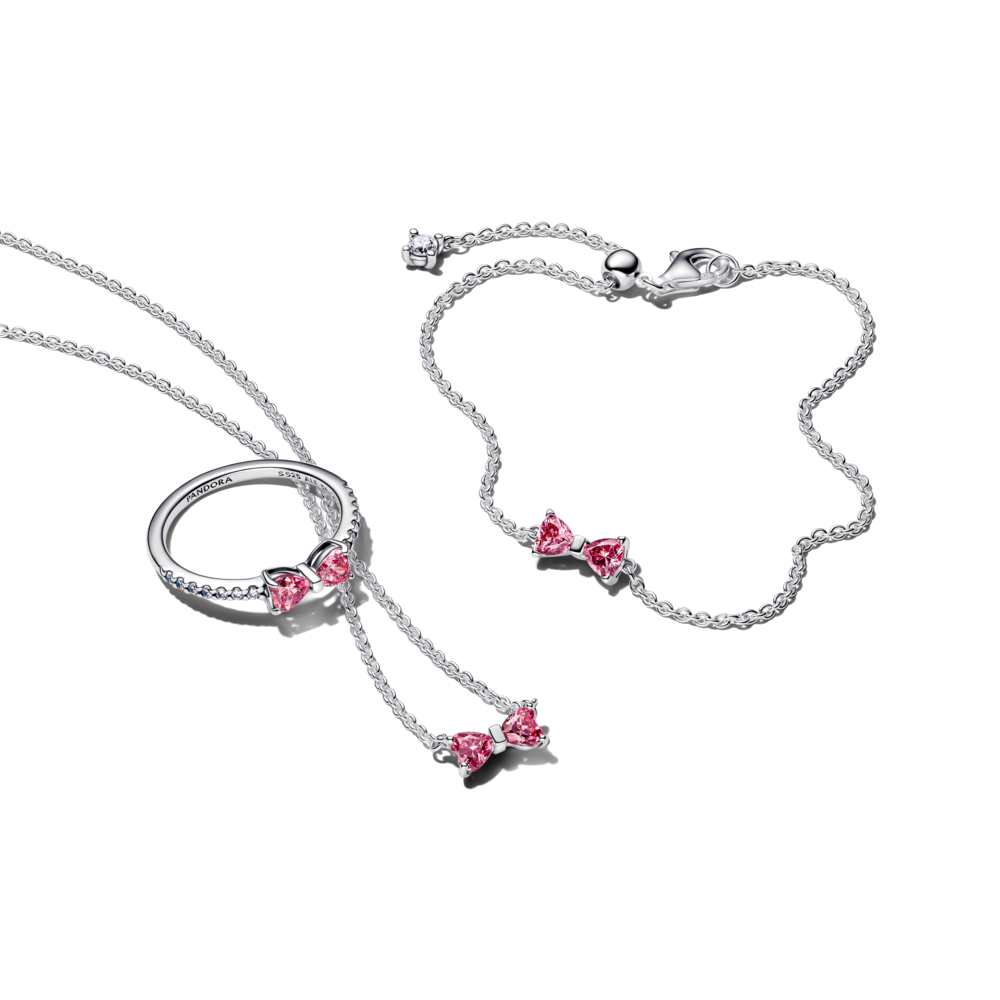 Bow sterling silver bracelet with fancy pink and clear cubic zirconia