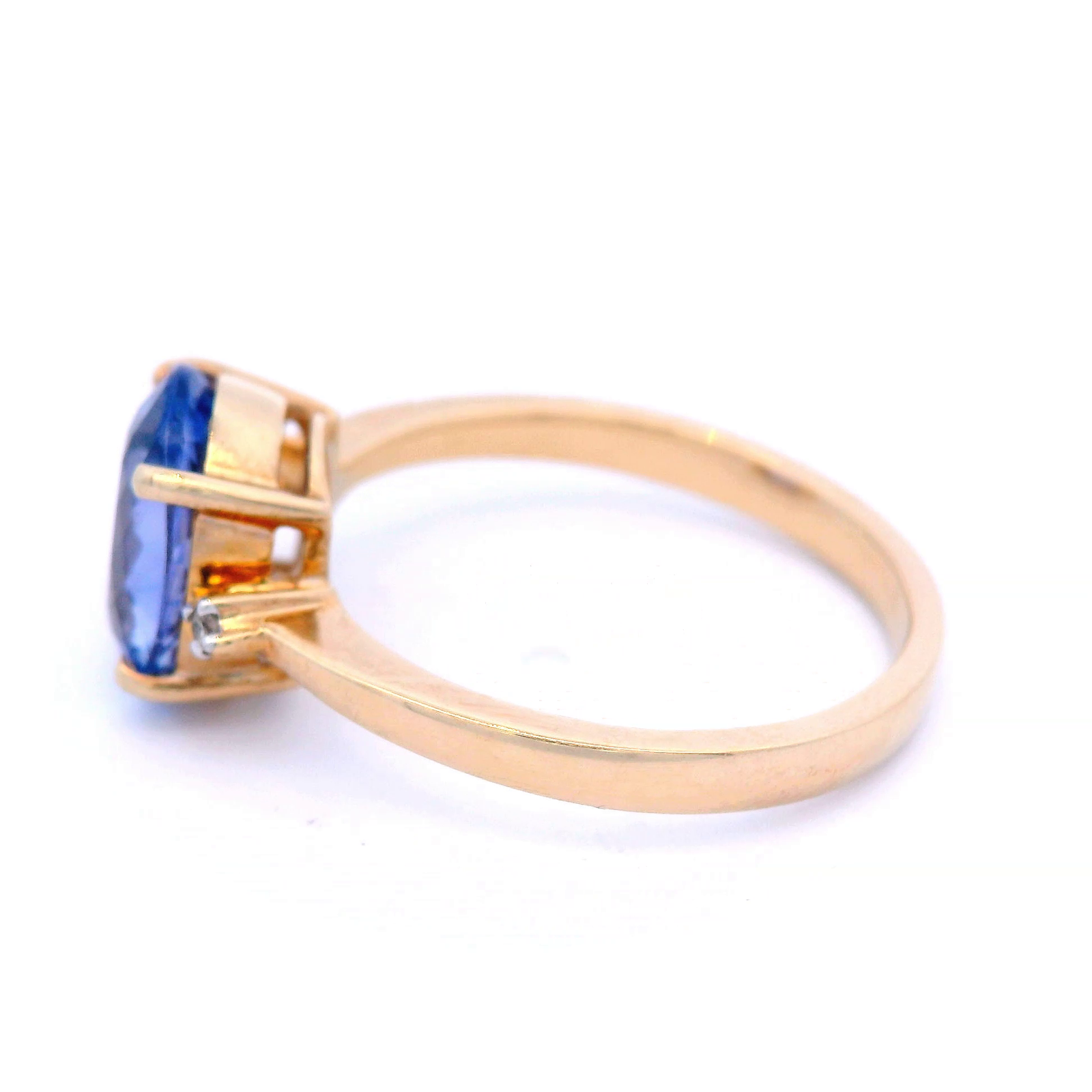 Natural Oval Tanzanite with Diamond Dress Ring in Yellow Gold