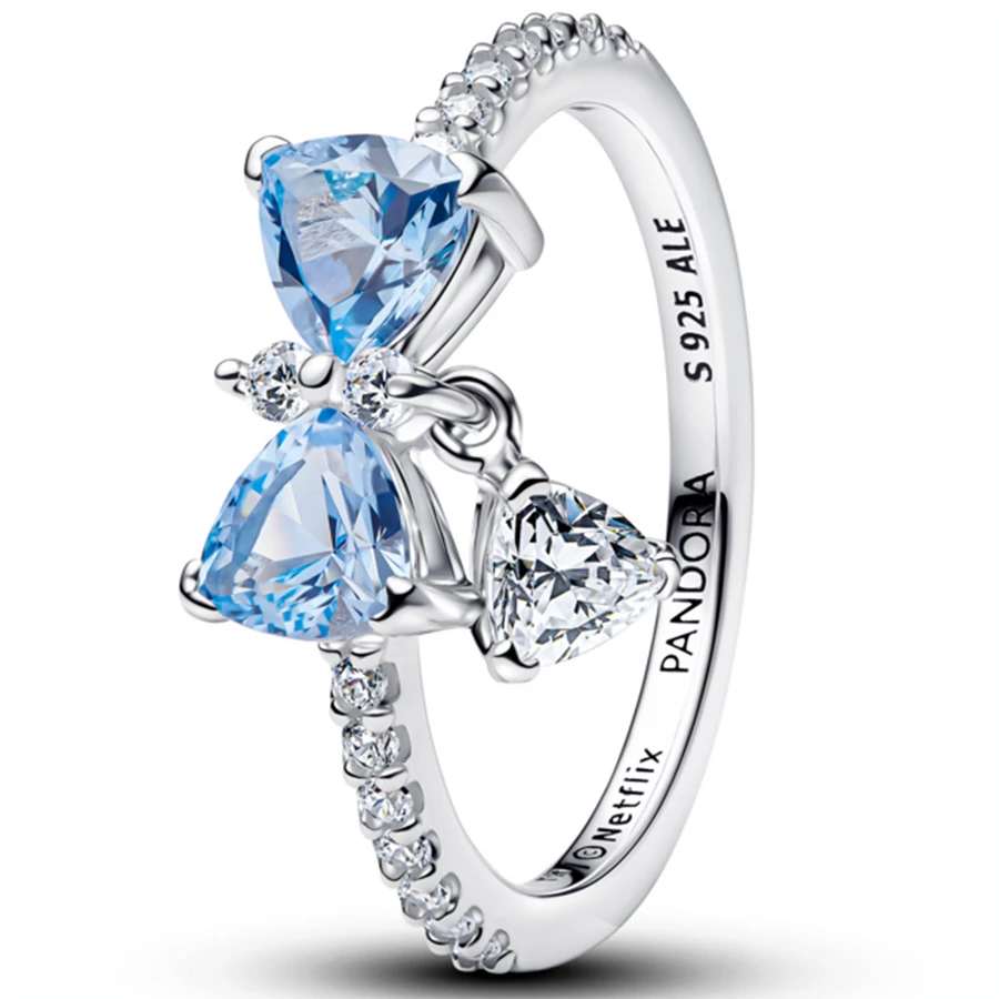 Bow sterling silver ring with dream blue crystal and clear cubic zirconia