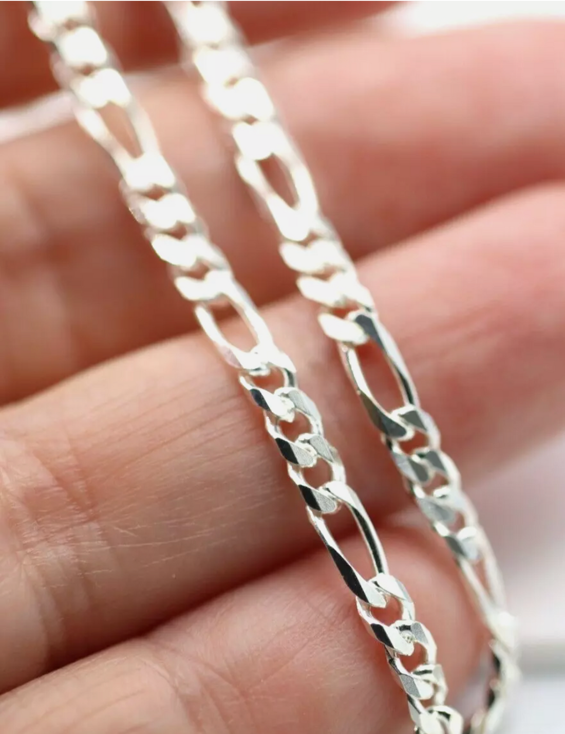 SS BEVELLED DIAM CUT FIGARO CHAIN