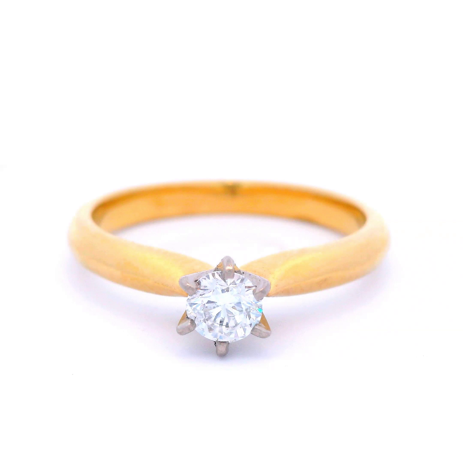 Diamond in a 6 Claw Yellow Gold Setting
