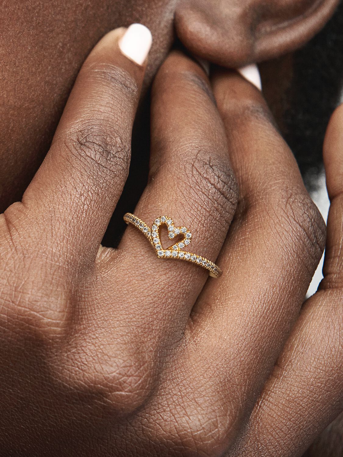 Heart and wishbone 14k gold-plated ring with clear cubic zirconia