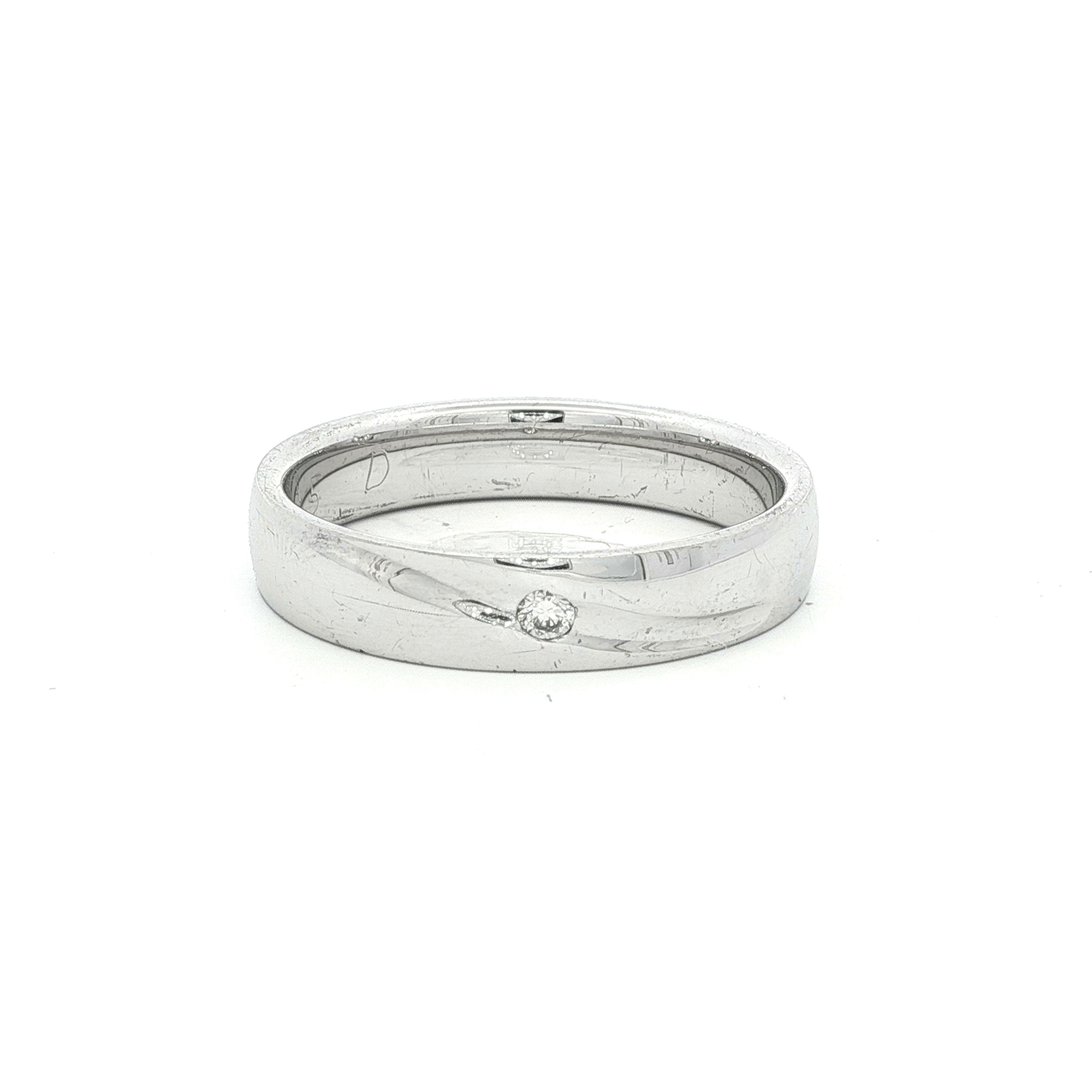 Platinum Band Ring with Round Brilliant Cut Diamond in White Gold