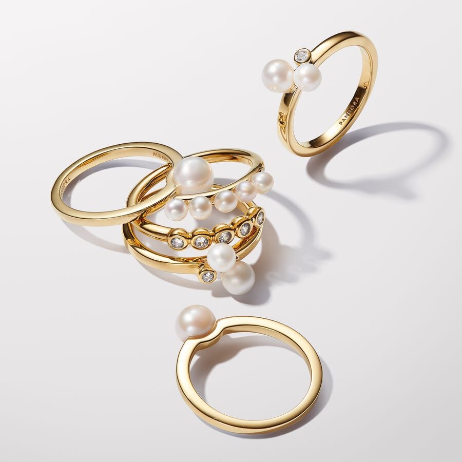 14k Gold-plated open ring with white treated freshwater cultured pearl and clear cubic zirconia