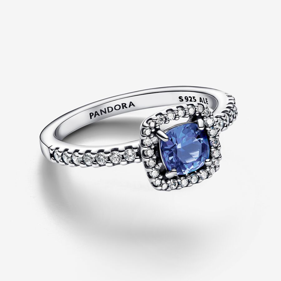 Sterling silver ring with cornflower blue crystal and clear cubic zirconia
