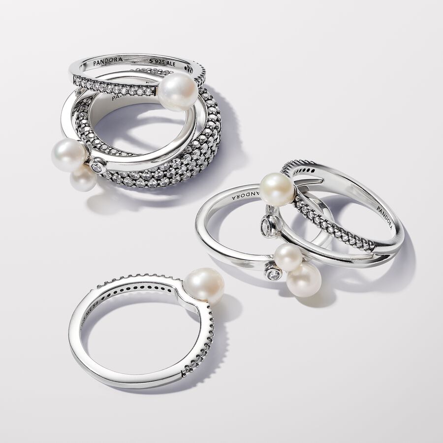 Sterling silver ring with white treated freshwater cultured pearl and clear cubic zirconia