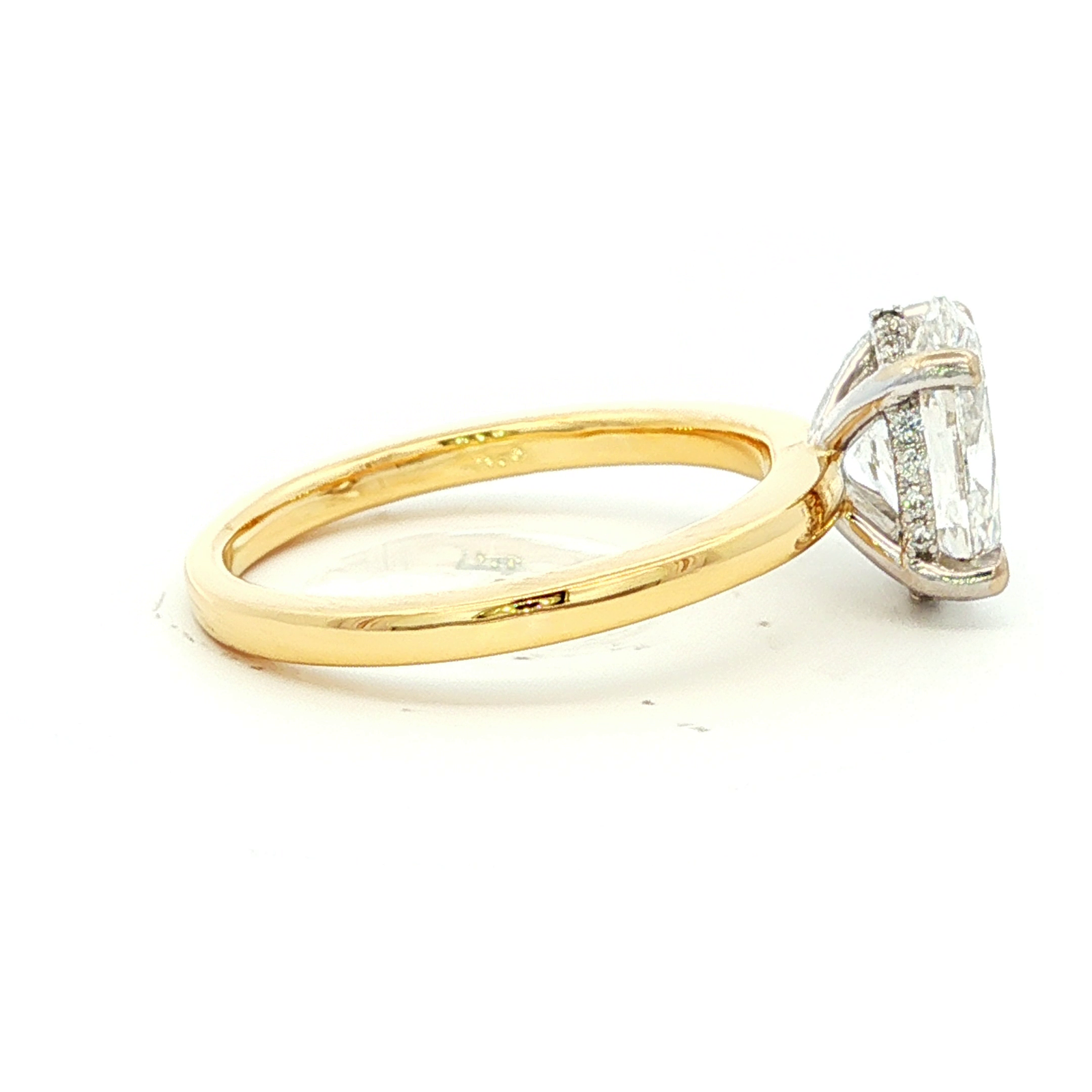 Oval Diamond Solitaire Ring in Yellow Gold