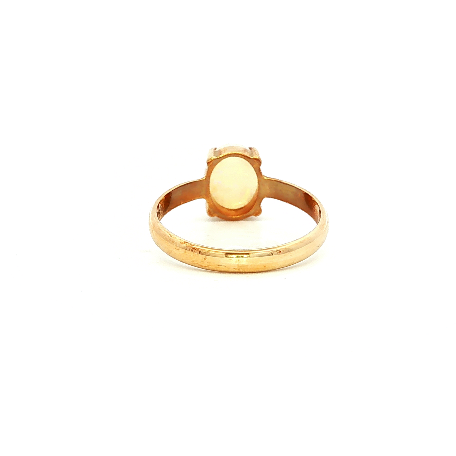 Solid Oval White Opal Ring in Yellow Gold