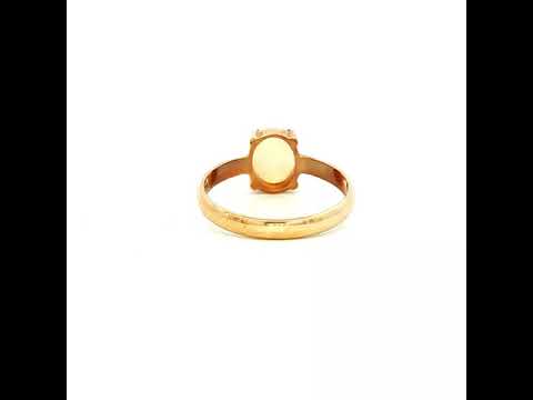 Solid Oval White Opal Ring in Yellow Gold