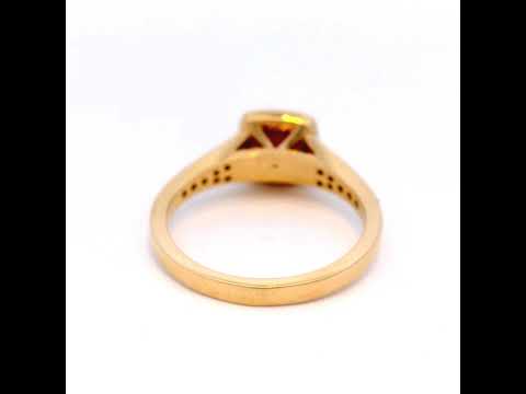 Ruby and Diamond Halo Set Ring in Yellow Gold