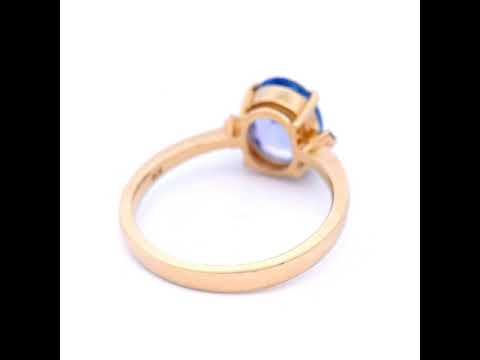 Natural Oval Tanzanite with Diamond Dress Ring in Yellow Gold