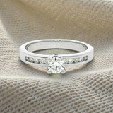 18ct White Gold Brilliant with Channel Set Shoulders