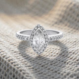 Marquise Diamond and Diamond Halo Engagement Ring in 18 Carat White Gold