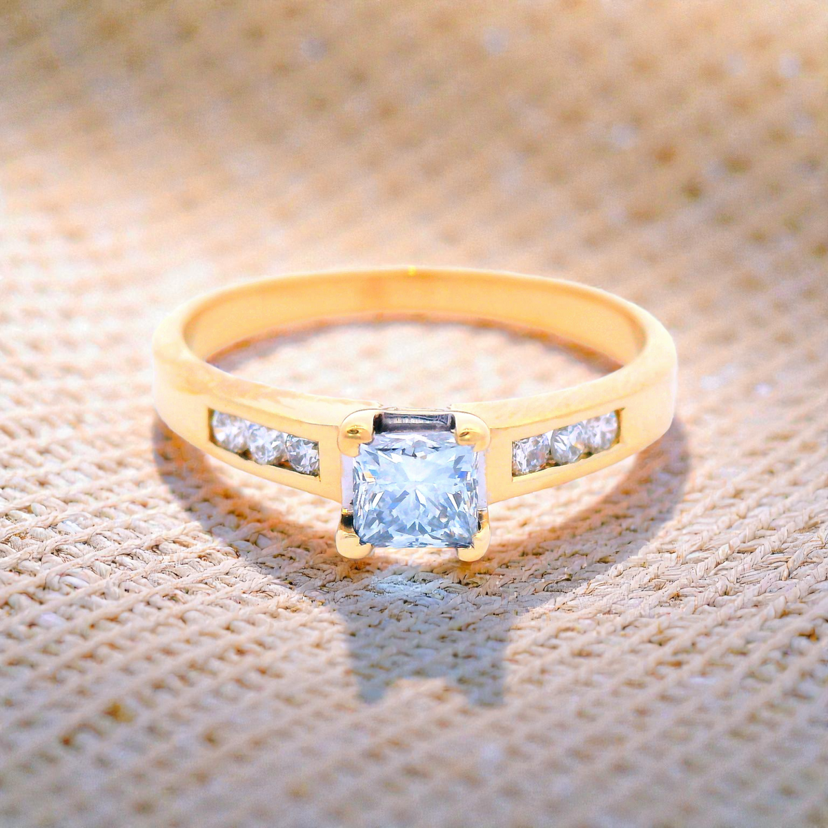 Princess Cut Diamond in Yellow Gold with Channel Set Shoulders