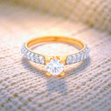 Round Brilliant Cut Diamond Ring with Pave Shoulder Stones