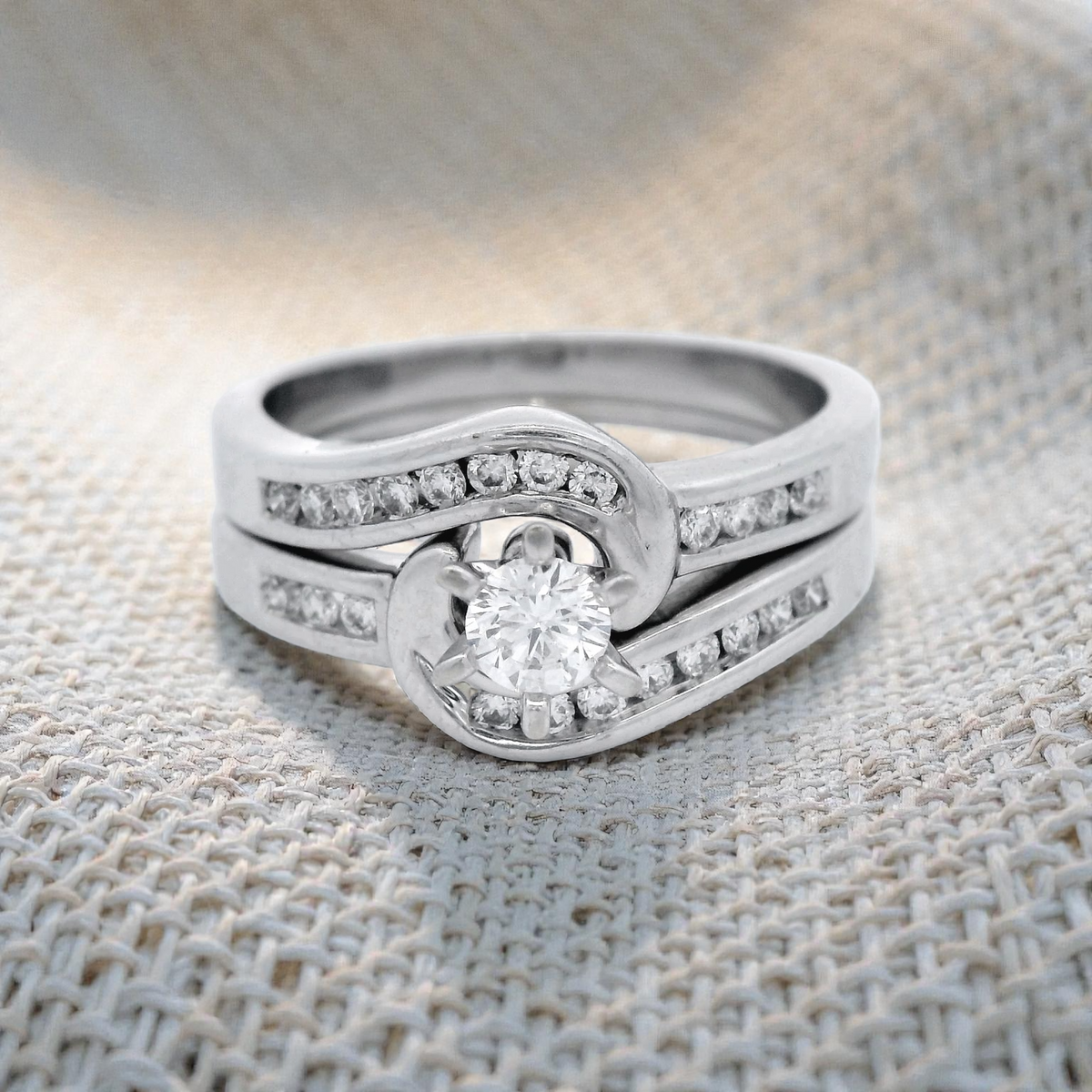 Diamond Ring with Swept Shoulder Sides set in White Gold