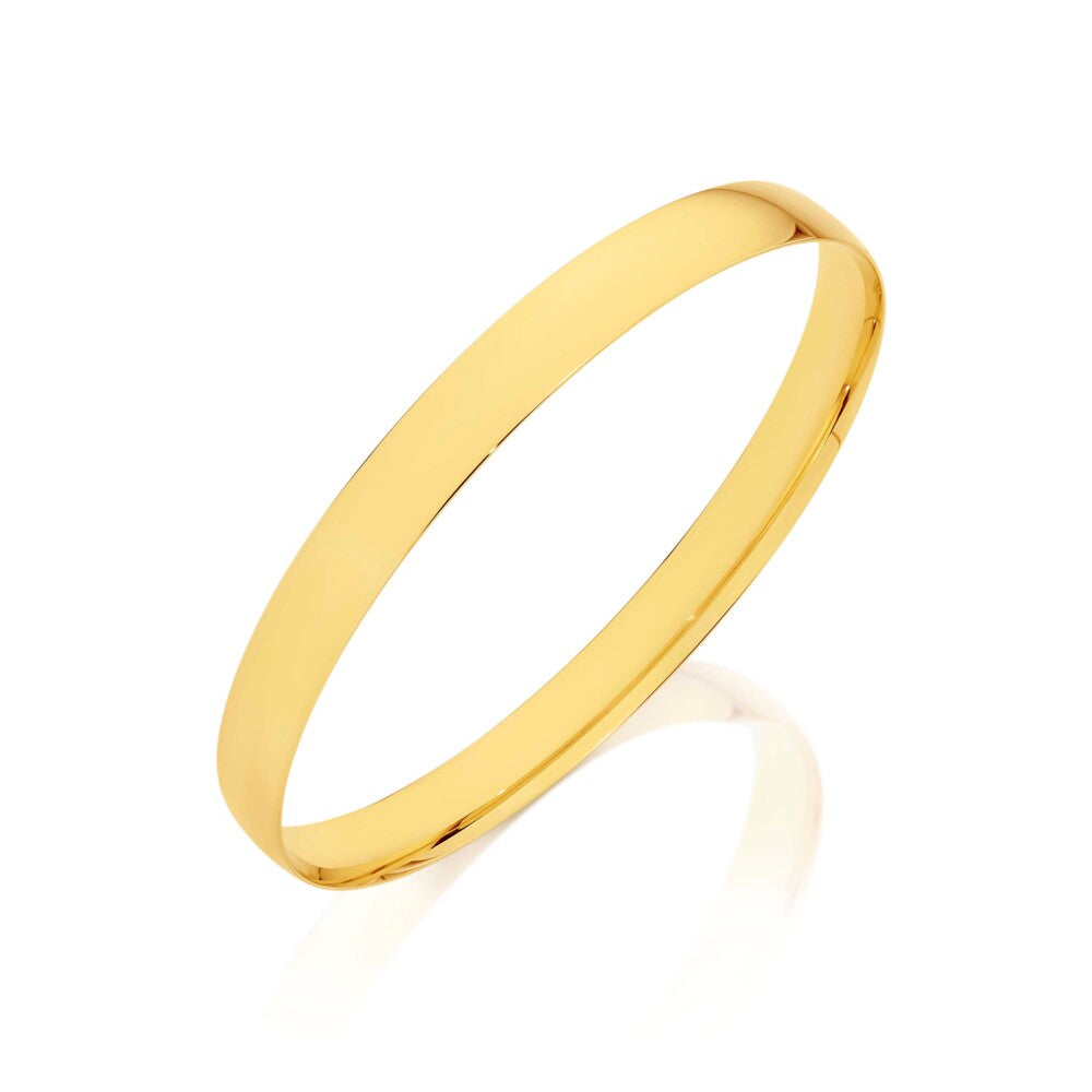 Solid Golf Bangle in Yellow Gold.