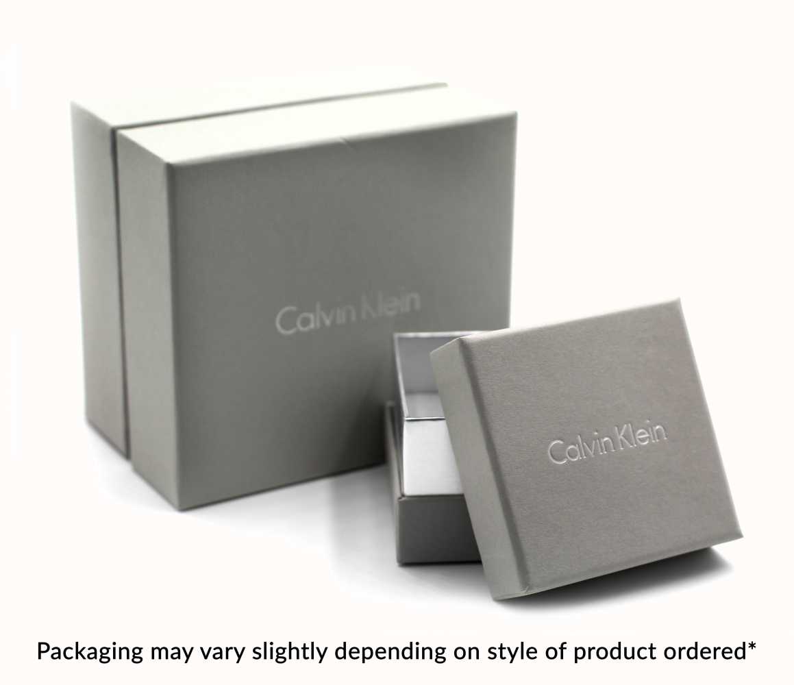 Calvin Klein Gold Tone Crystal Set Disc Bracelet.