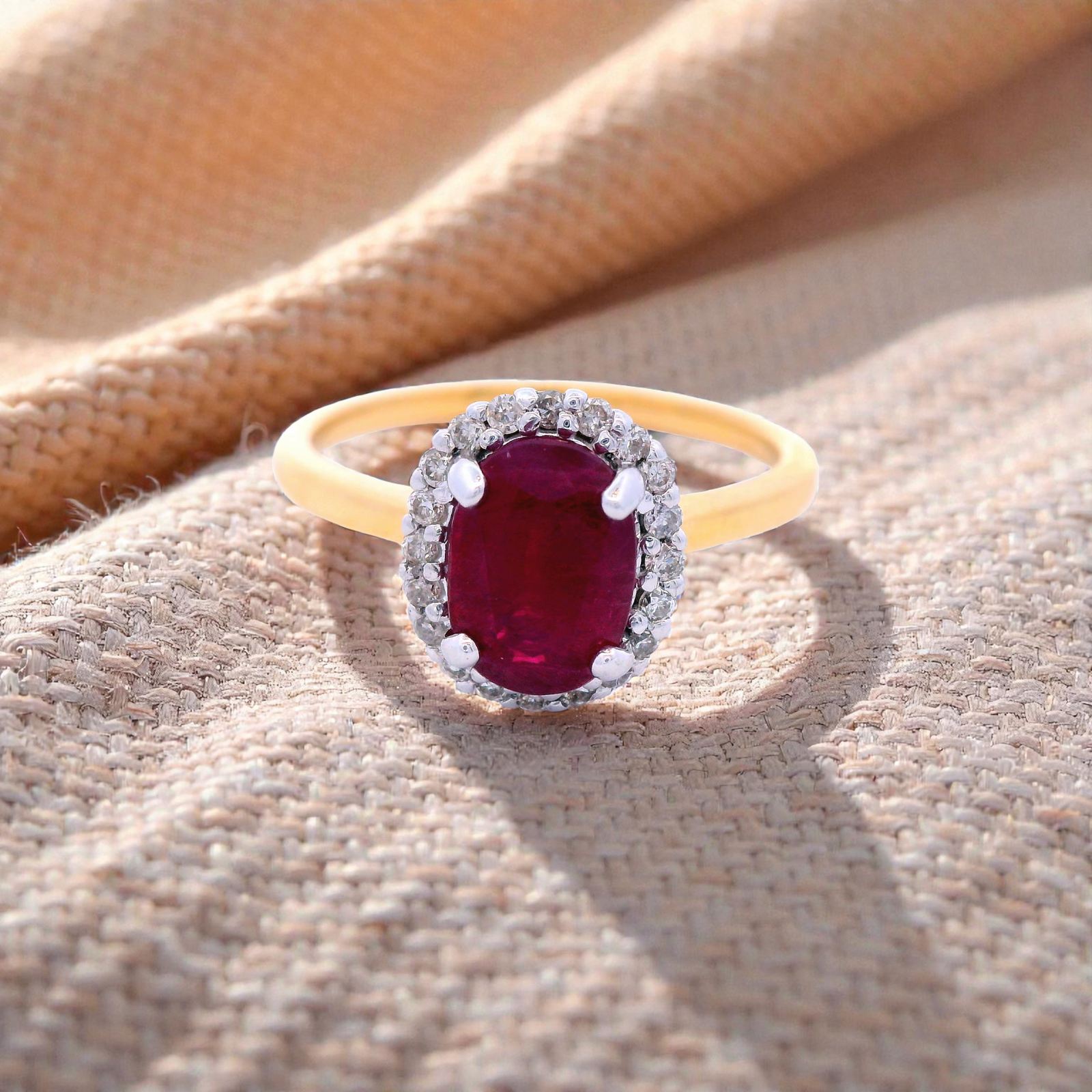 Oval Shaped Ruby with Diamond Halo Cluster in Yellow Gold