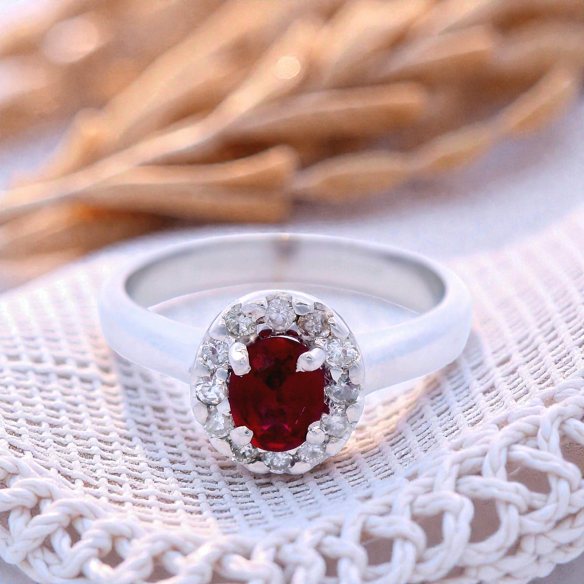 Natural Oval Ruby in White Gold with Round Brilliant Cut Halo Diamond