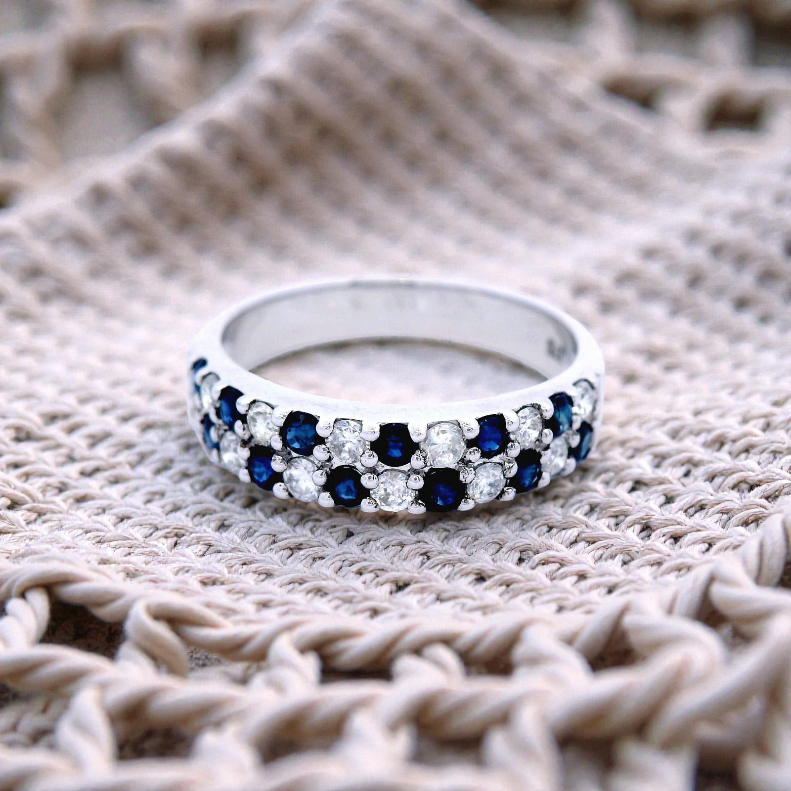 12 x Saph = 0.50. 12 x Dia = 0.37 ct. 9ct WG