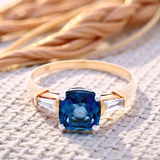 London Blue Topaz and Tapered Baguette Diamond Dress Ring