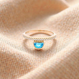 Diamond and Blue Topaz Dress Ring in Yellow Gold