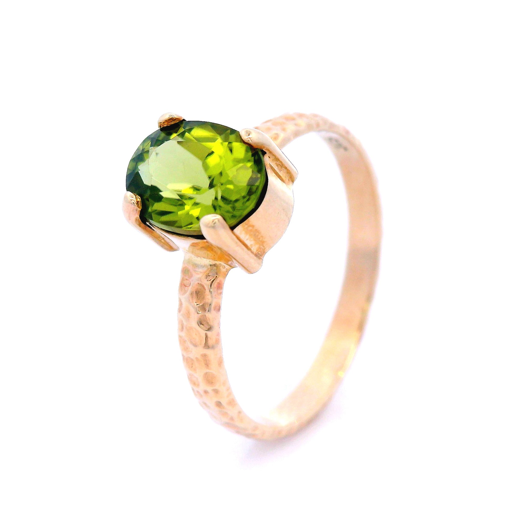 Oval Peridot in a 4 Claw Setting and Hammered Detail Band