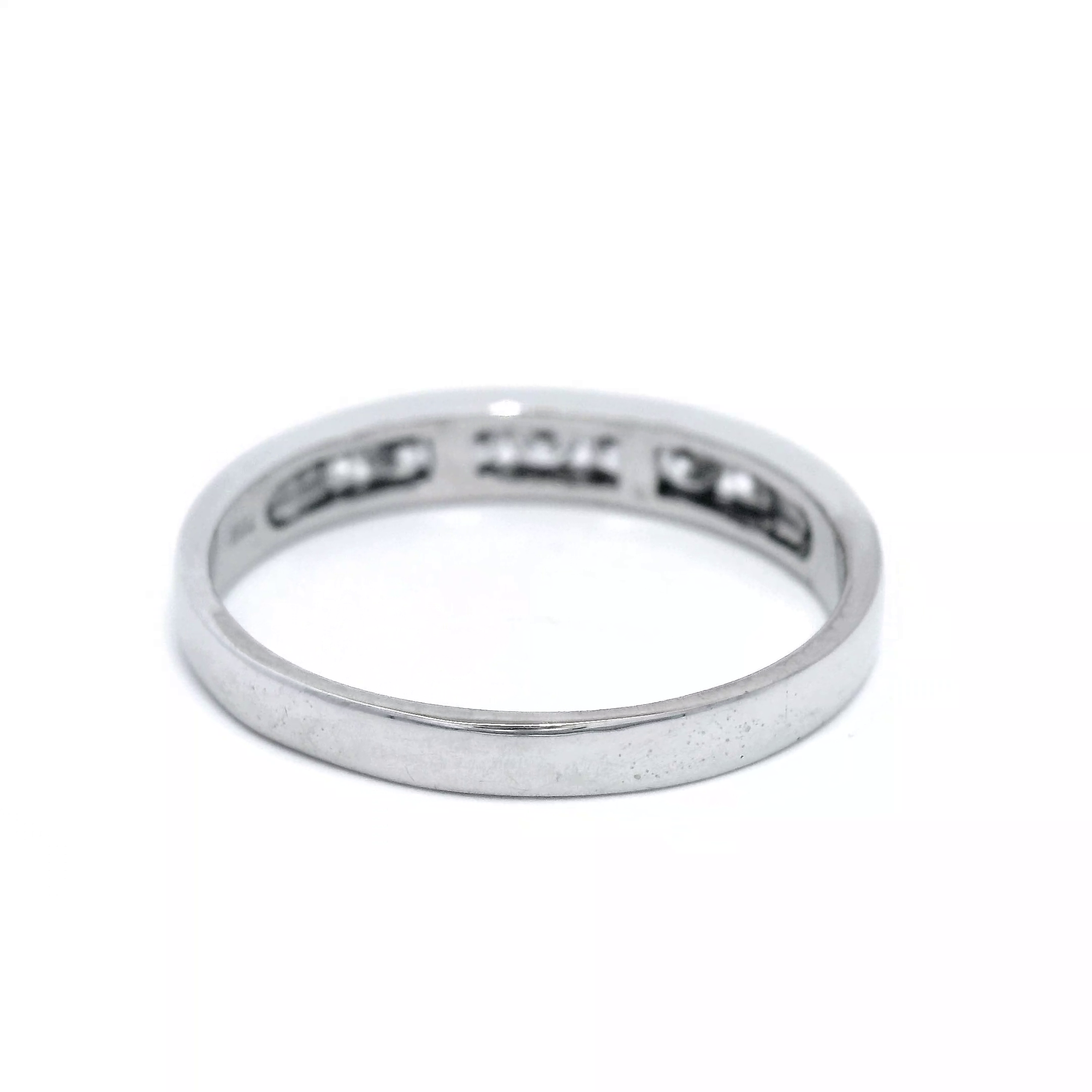 Q7 18CT W/G 7=.39CT RBC CHANNEL SET BAND SZ N