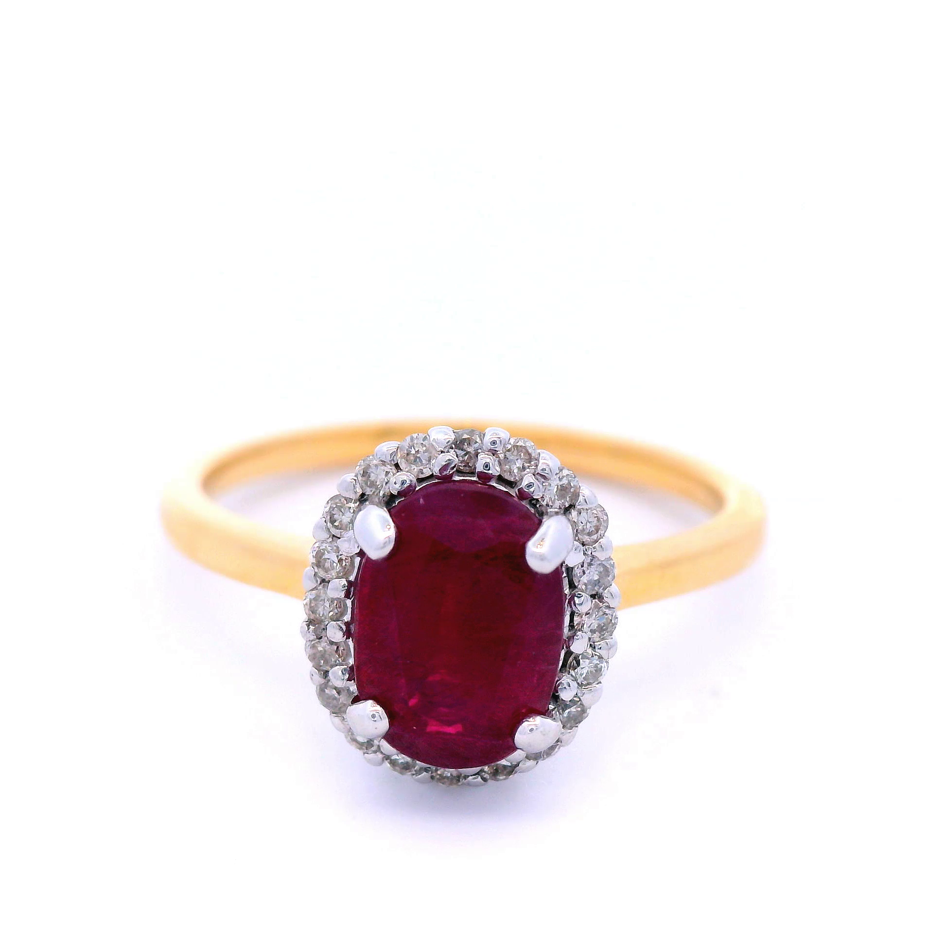 Oval Shaped Ruby with Diamond Halo Cluster in Yellow Gold