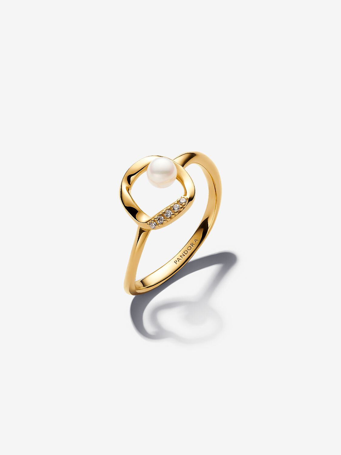 14k gold-plated ring with treated white freshwater cultured pearl and clear cubic zirconia