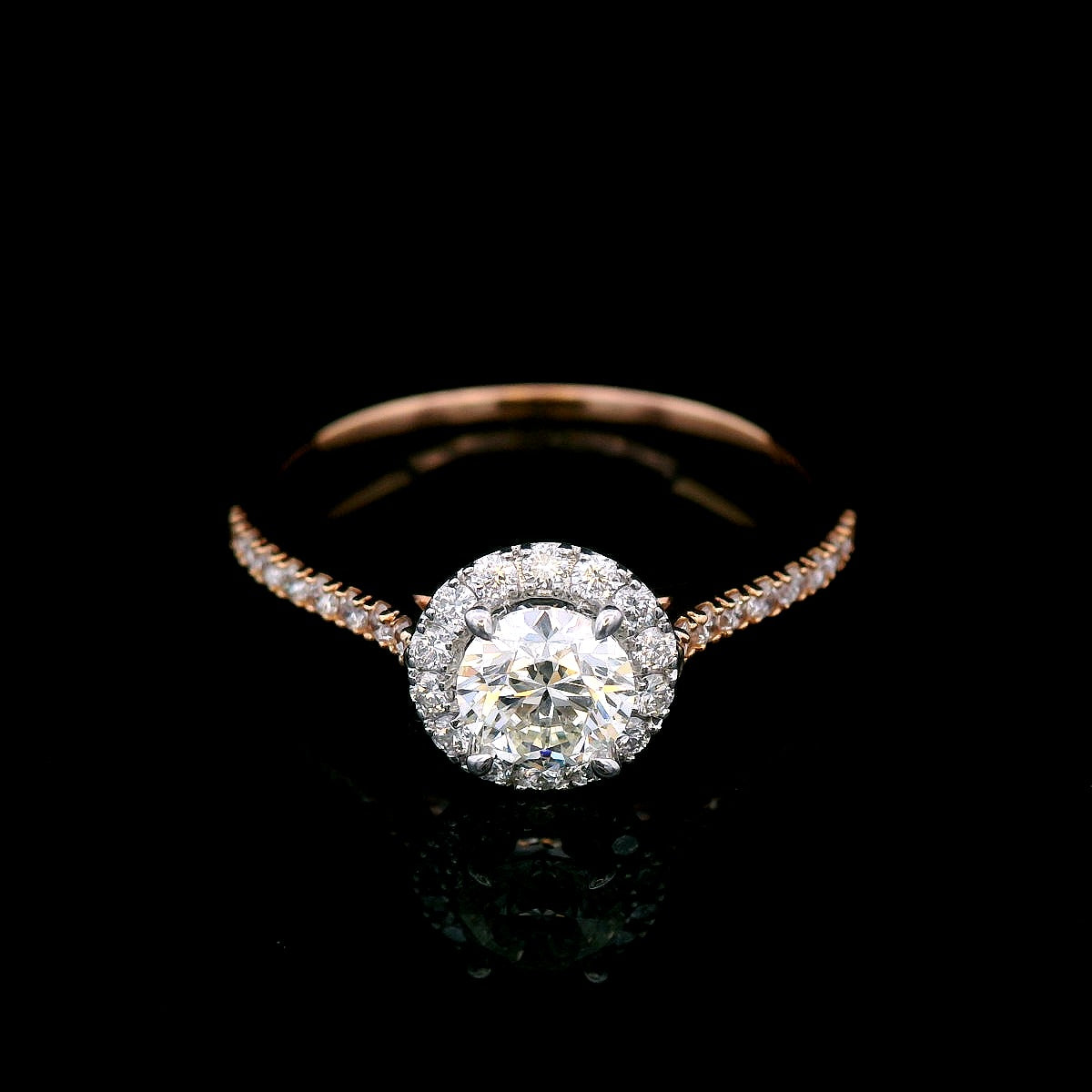 Diamond Halo Engagement Ring in18 Carat Rose Gold