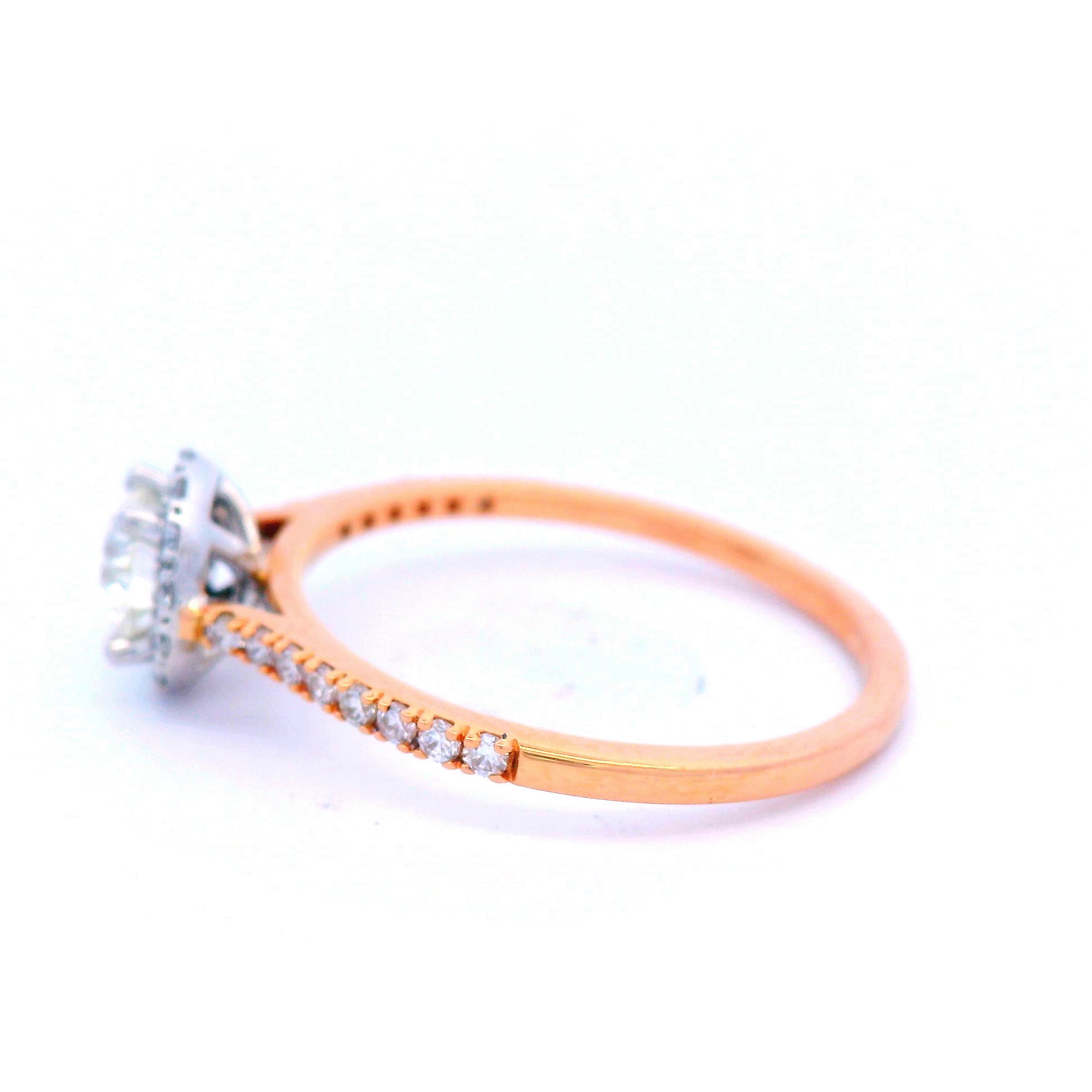 Diamond Halo Engagement Ring in18 Carat Rose Gold