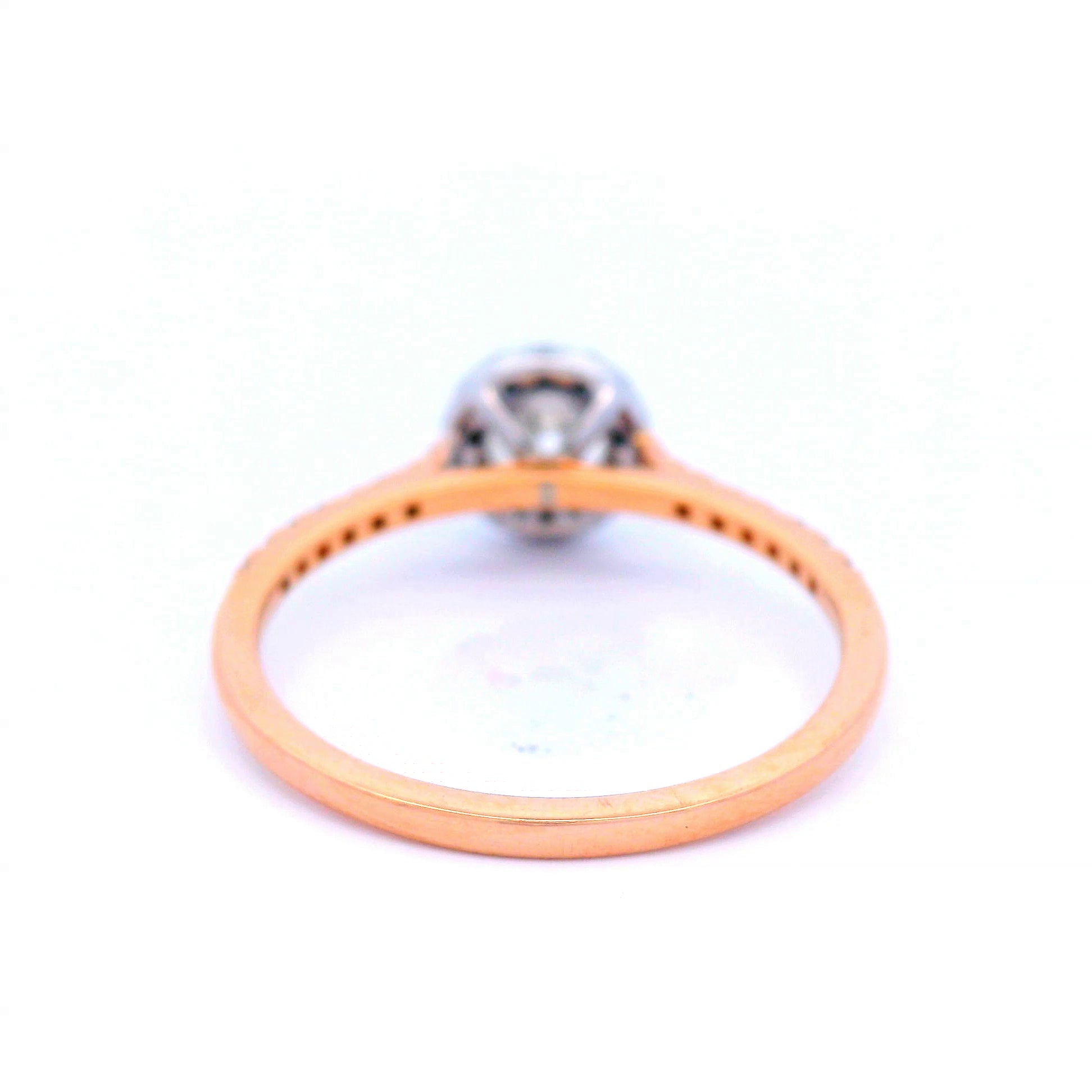 Diamond Halo Engagement Ring in18 Carat Rose Gold