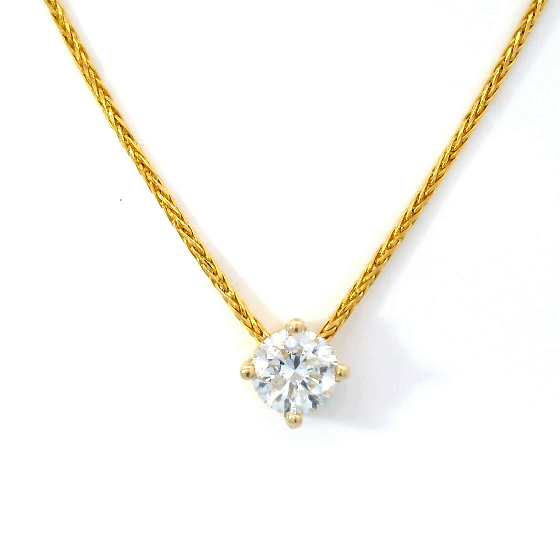 Diamond Slider Pendant on Yellow Gold Wheat Chain.