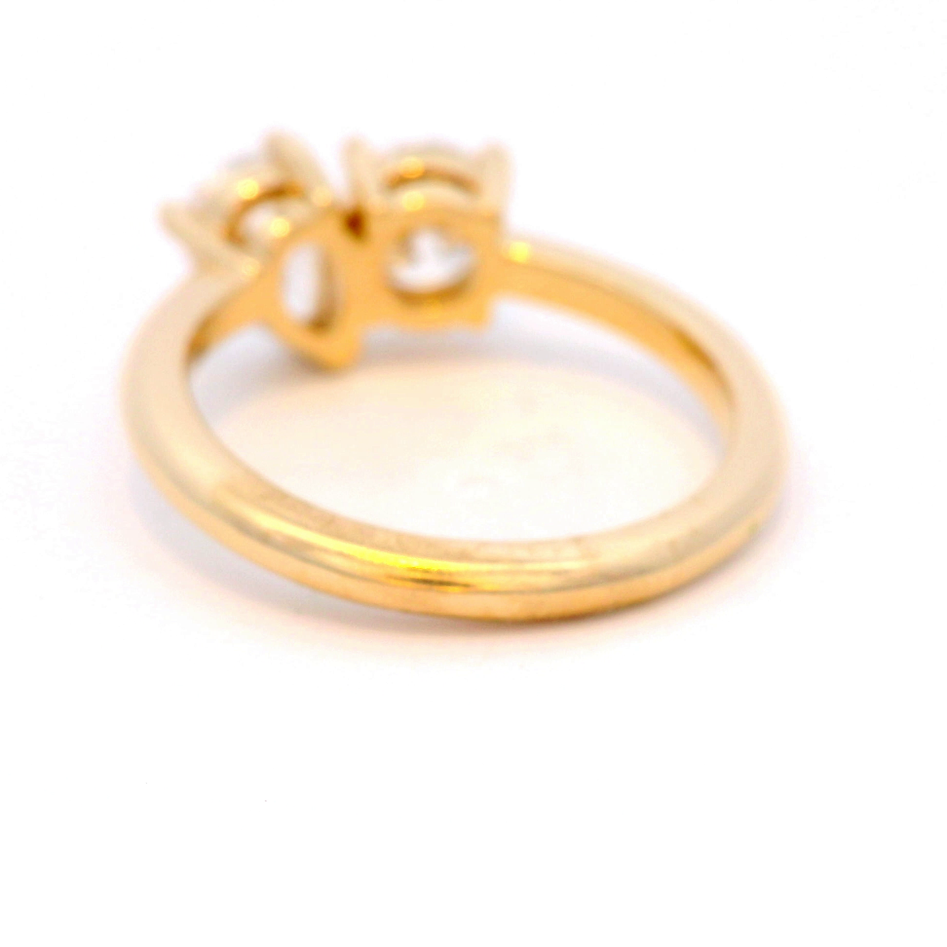 Round and Pear Shaped Diamonds Set in Yellow Gold