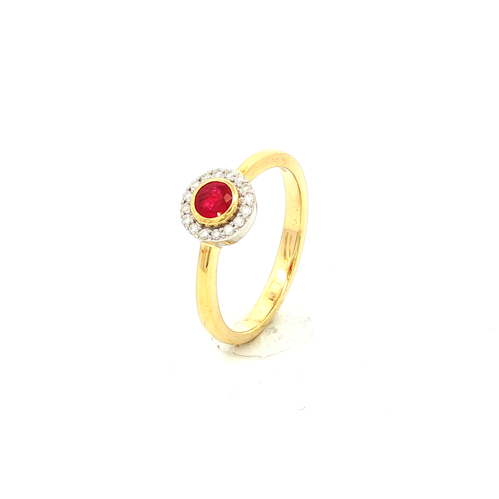 Ruby and Diamond Halo Ring in Yellow Gold