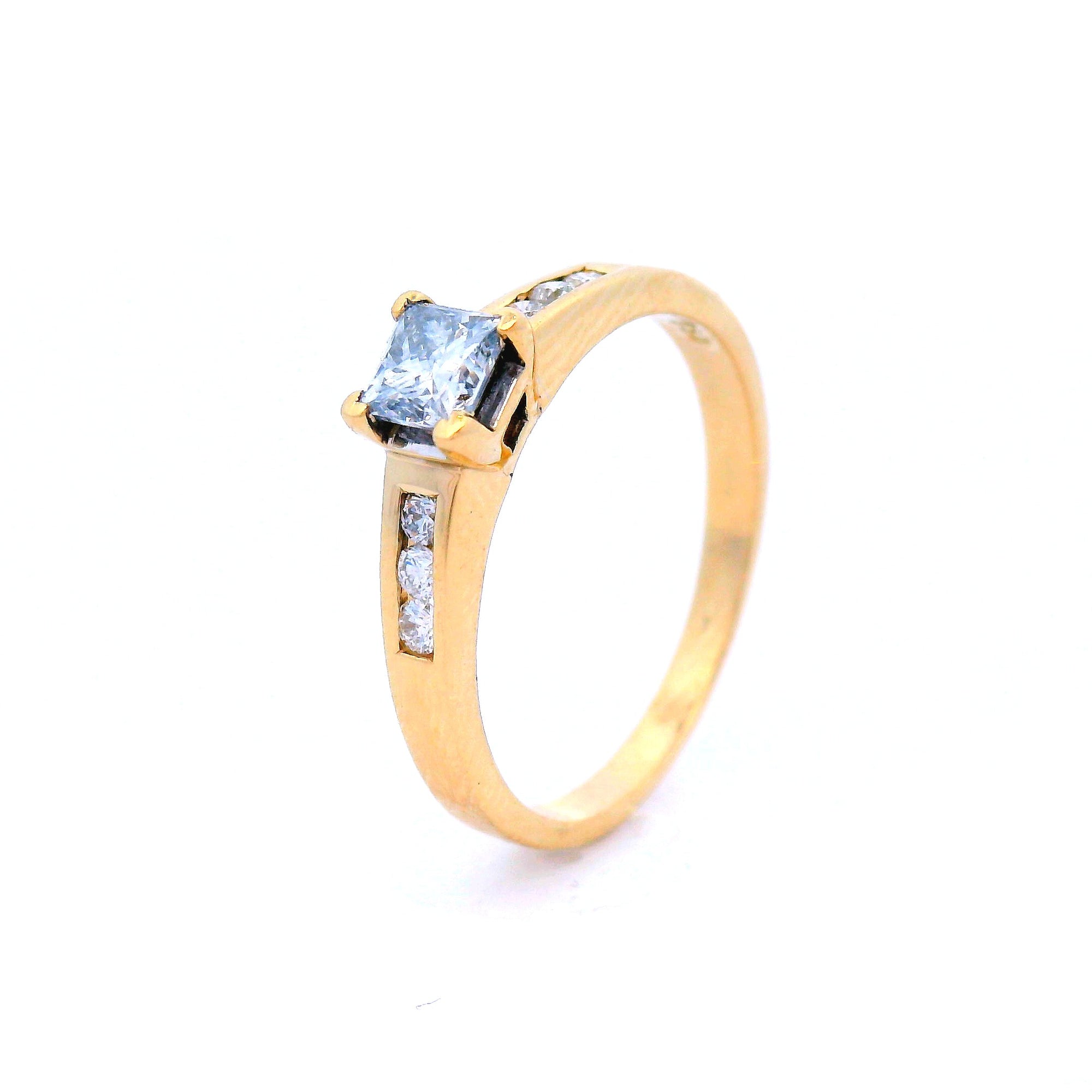 Princess Cut Diamond in Yellow Gold with Channel Set Shoulders